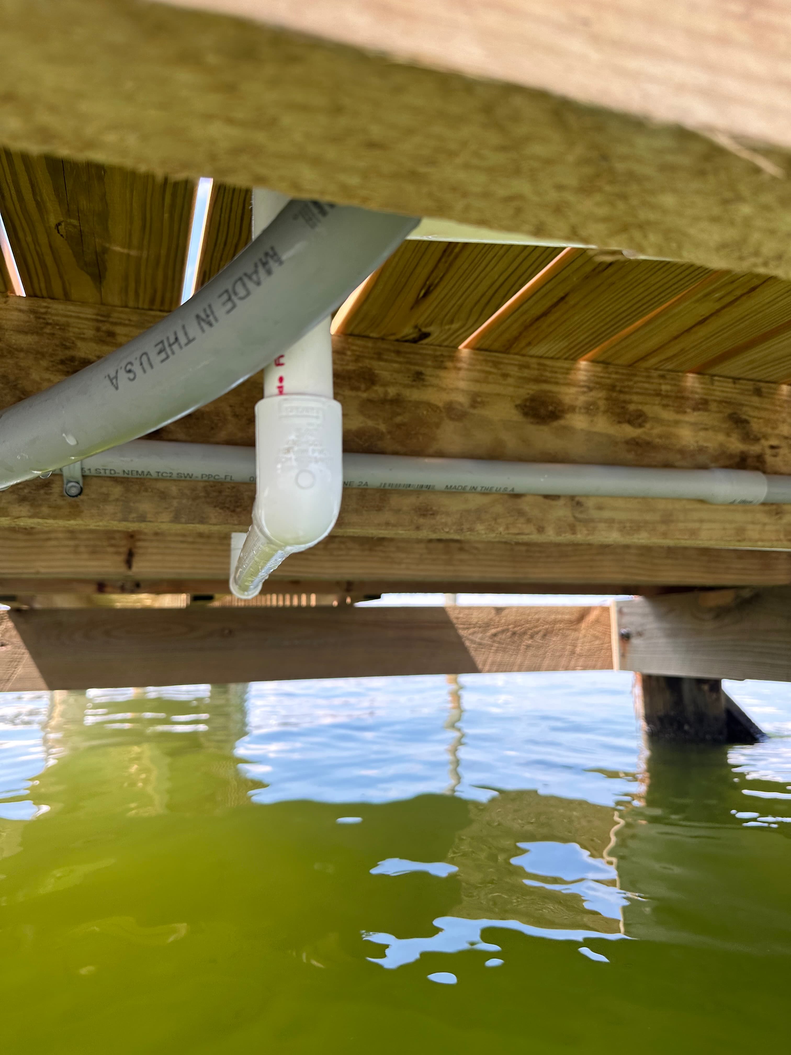 Dock drain pipe installation