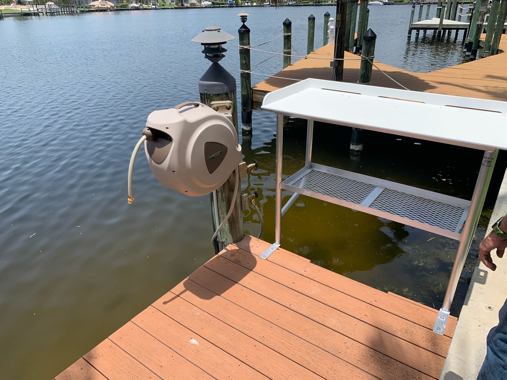 Dock hose reel and fish station