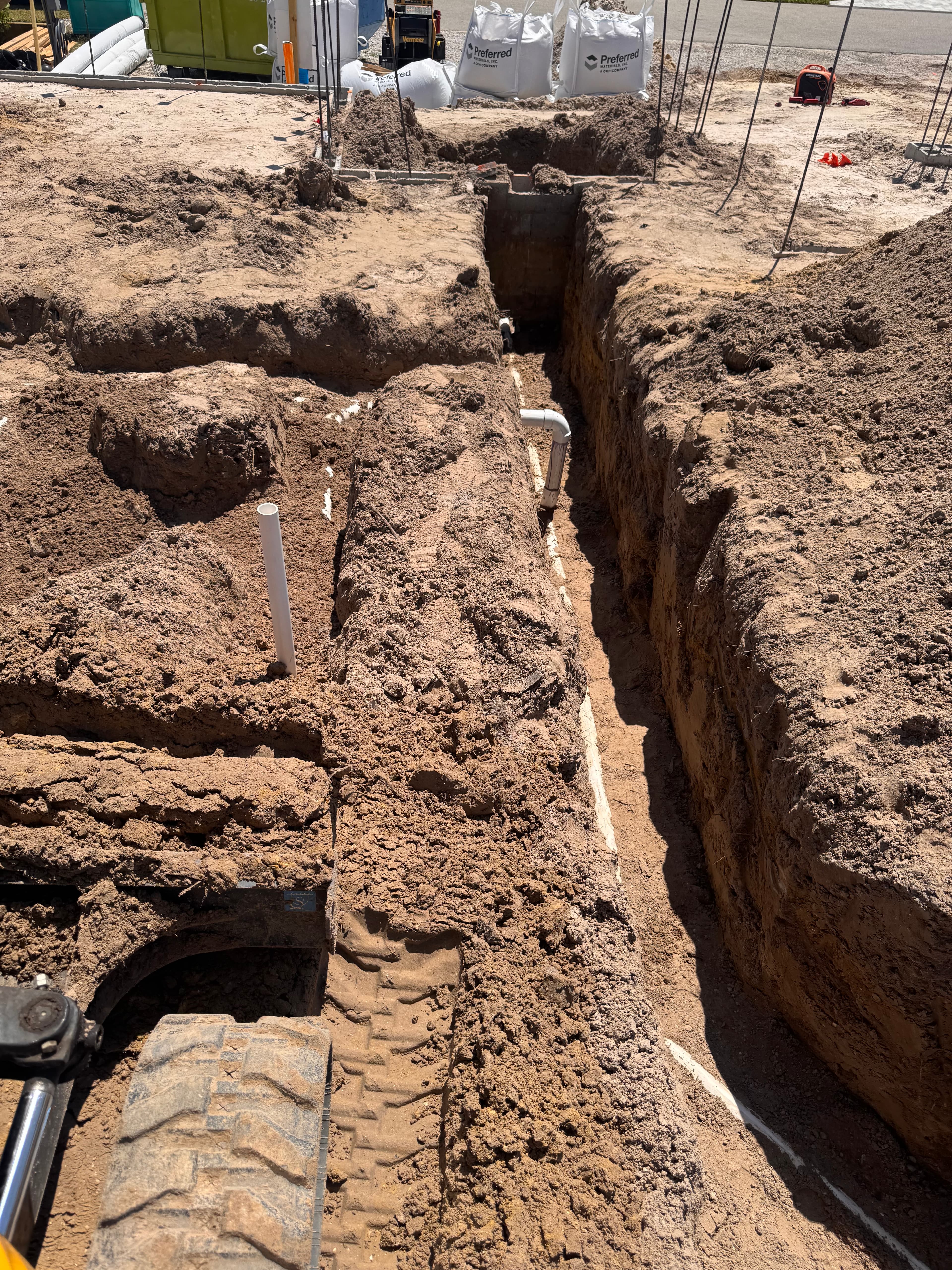 Drain line trenching
