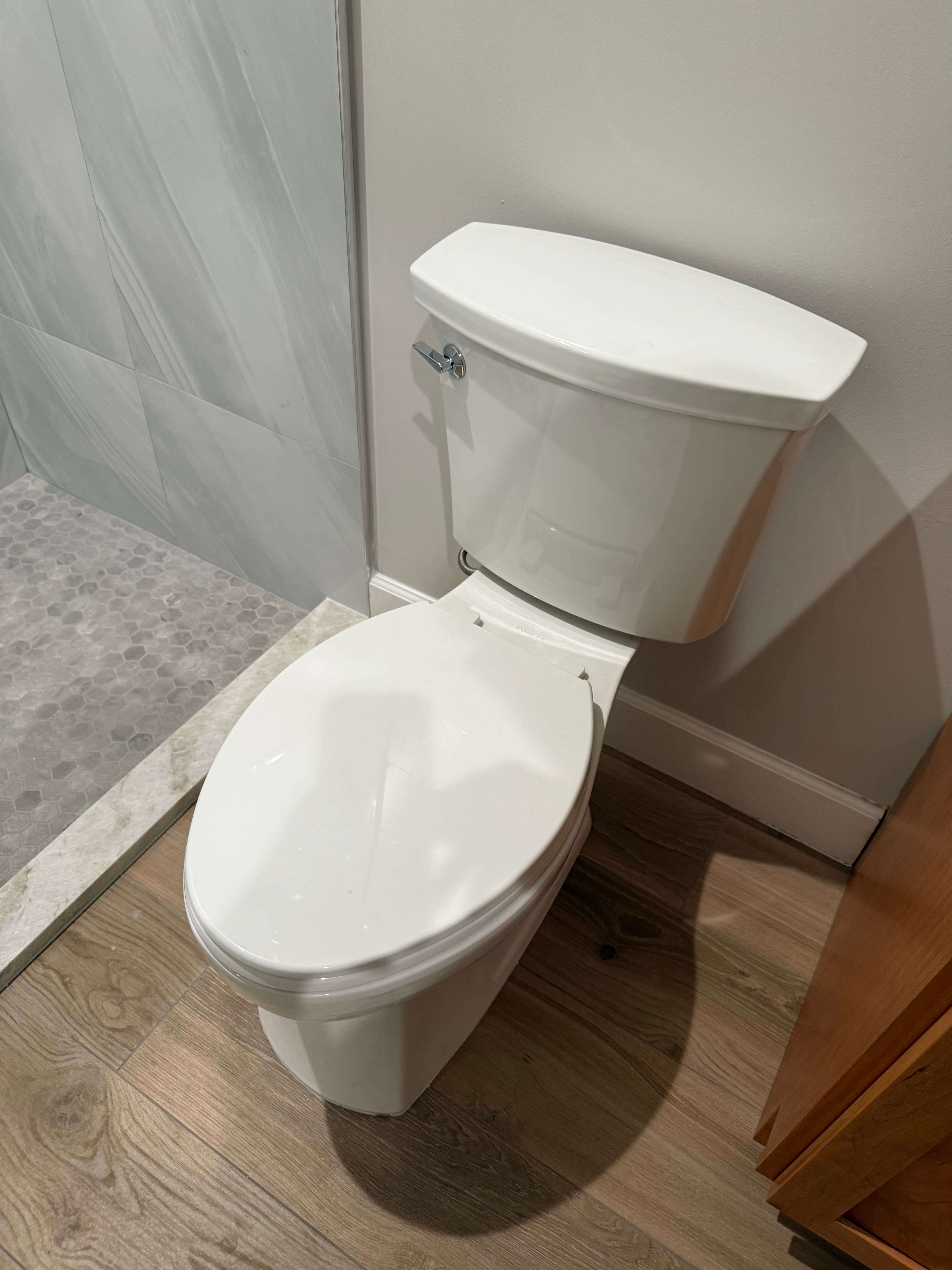 Toilet install with tile work