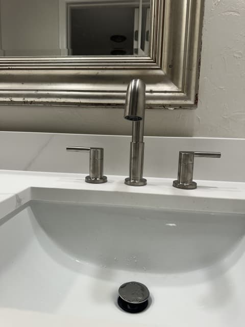 Widespread bathroom faucet